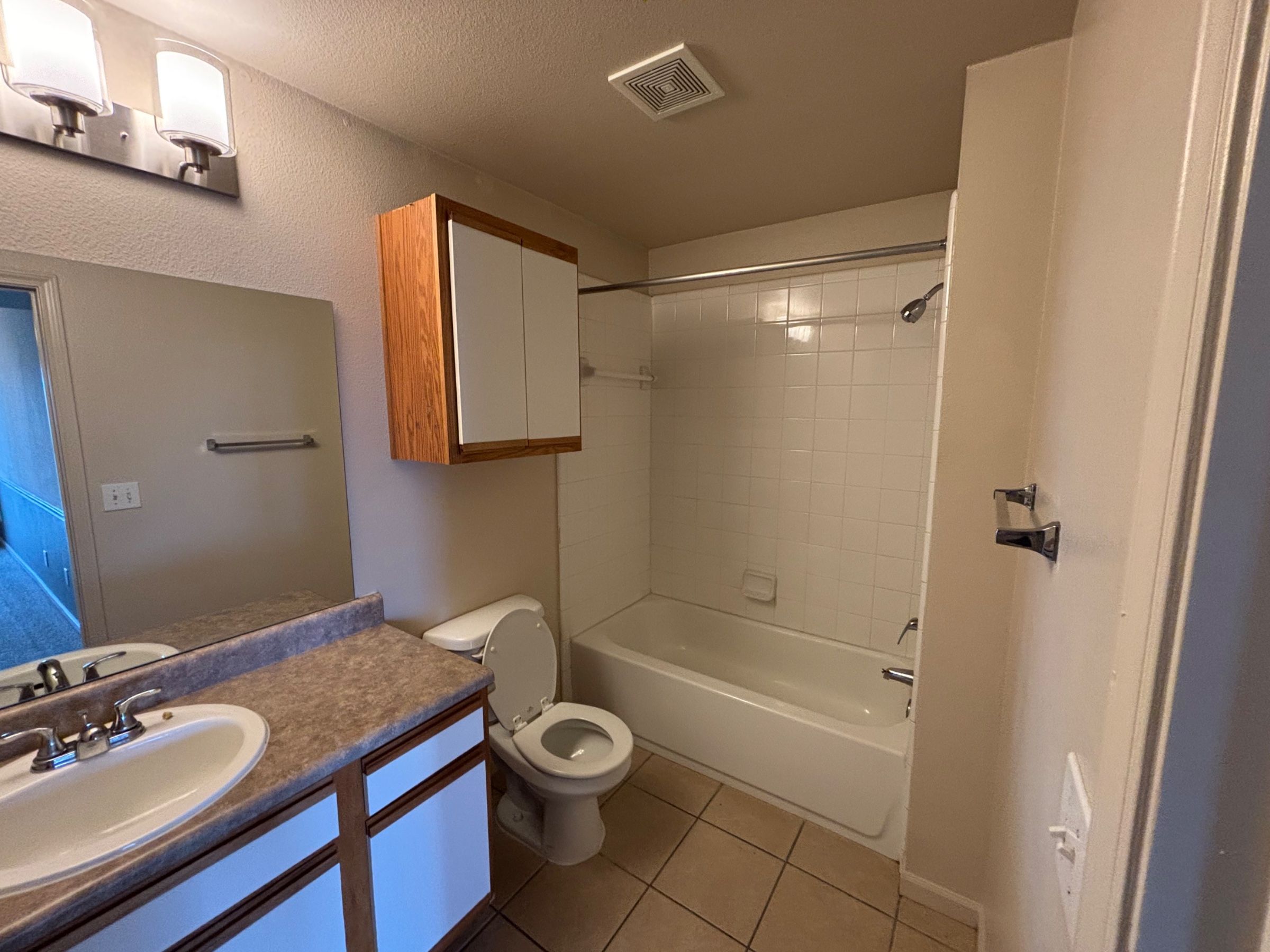 Unfurnished master bedroom with connected bath and closet. 